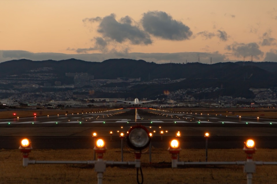 A runway lit for landing at dusk